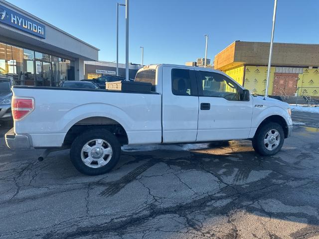 Used 2014 Ford F-150 XLT with VIN 1FTFX1CF1EKE73736 for sale in Kansas City