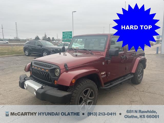 Used 2009 Jeep Wrangler Unlimited Sahara with VIN 1J4GA59159L701496 for sale in Kansas City