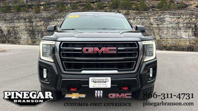 Used 2021 GMC Yukon AT4 with VIN 1GKS2CKD9MR229707 for sale in Branson, MO