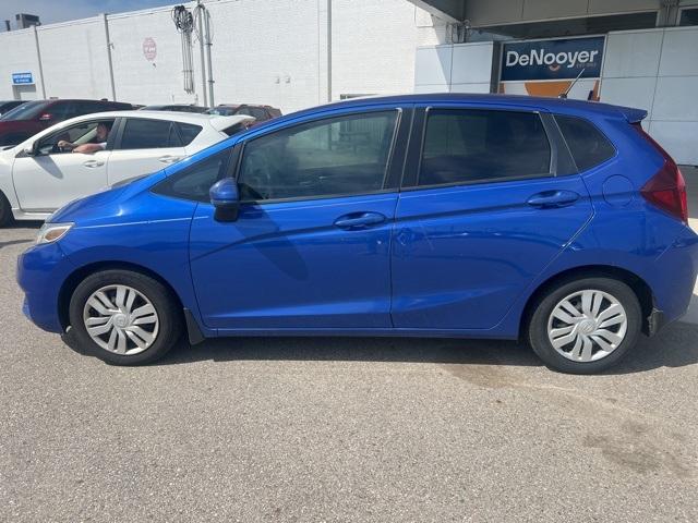 Used 2016 Honda Fit LX with VIN JHMGK5H51GX003690 for sale in Holland, MI
