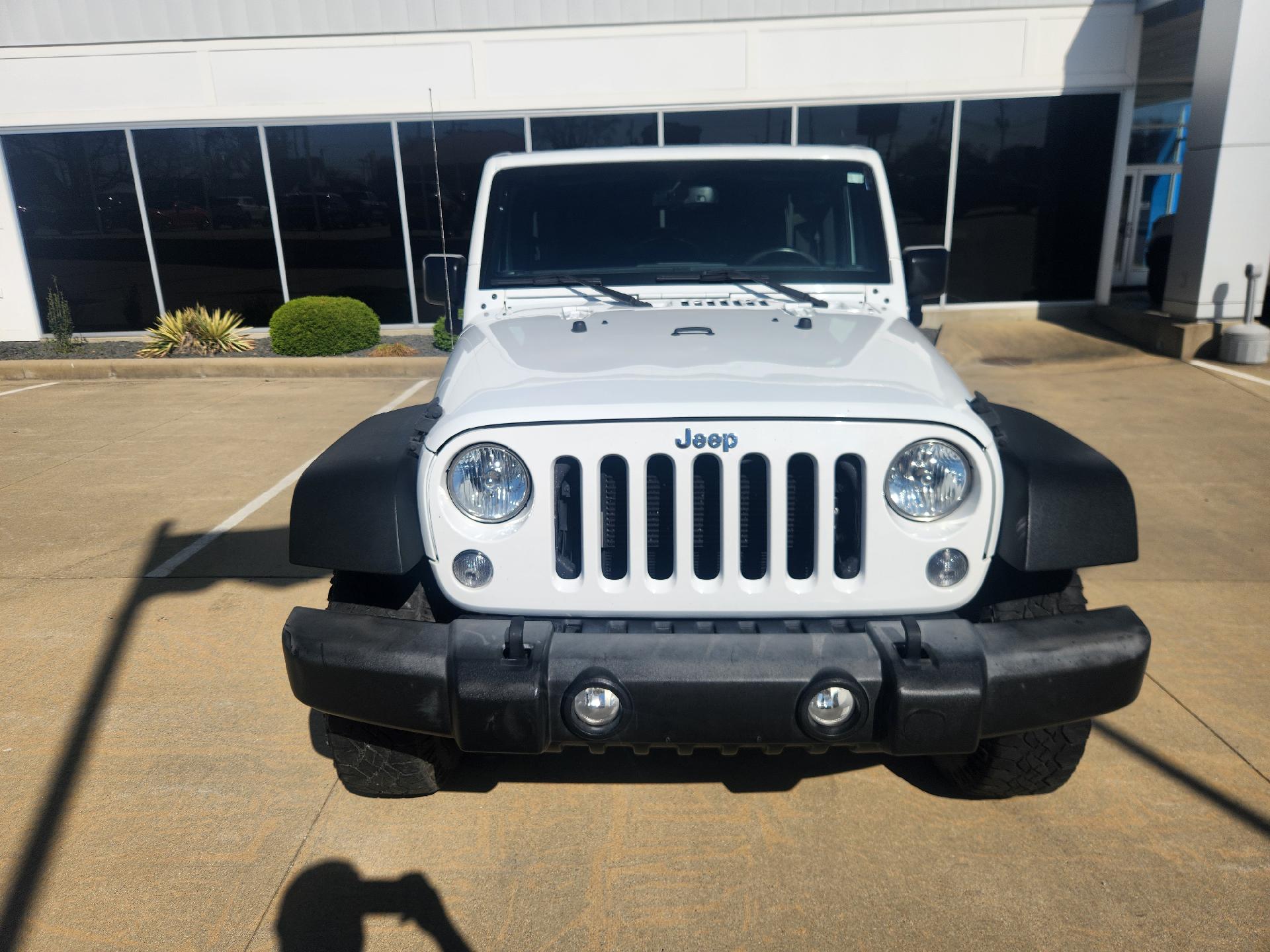Used 2016 Jeep Wrangler Unlimited Sport with VIN 1C4BJWDG5GL341886 for sale in Sparta, IL