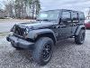 Used 2014 Jeep Wrangler Unlimited Sport with VIN 1C4BJWDG2EL177865 for sale in Hartselle, AL