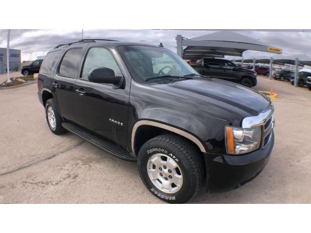 Used 2014 Chevrolet Tahoe LT with VIN 1GNSKBE02ER131044 for sale in Rapid City, SD