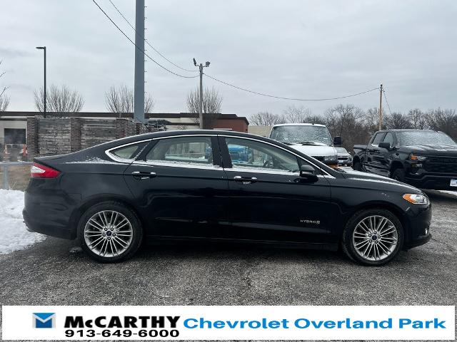 Used 2014 Ford Fusion SE Hybrid with VIN 3FA6P0LU7ER176674 for sale in Kansas City