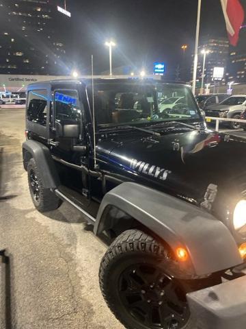 Used 2016 Jeep Wrangler Willys Wheeler with VIN 1C4AJWAG1GL237475 for sale in Houston, TX