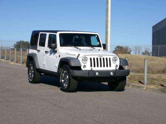 Used 2014 Jeep Wrangler Unlimited Rubicon with VIN 1C4BJWFG0EL156185 for sale in Ozark, AL