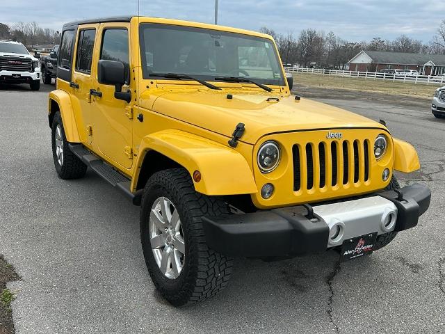 Used 2015 Jeep Wrangler Unlimited Sahara with VIN 1C4BJWEG2FL570829 for sale in Dexter, MO