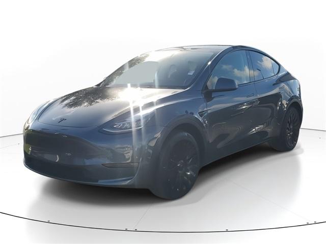 Used 2022 Tesla Model Y Long Range with VIN 7SAYGDEE6NA005707 for sale in Miami, FL