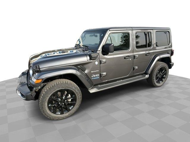 Certified 2021 Jeep Wrangler Unlimited Sahara 4XE with VIN 1C4JJXP67MW800673 for sale in Alexandria, Minnesota