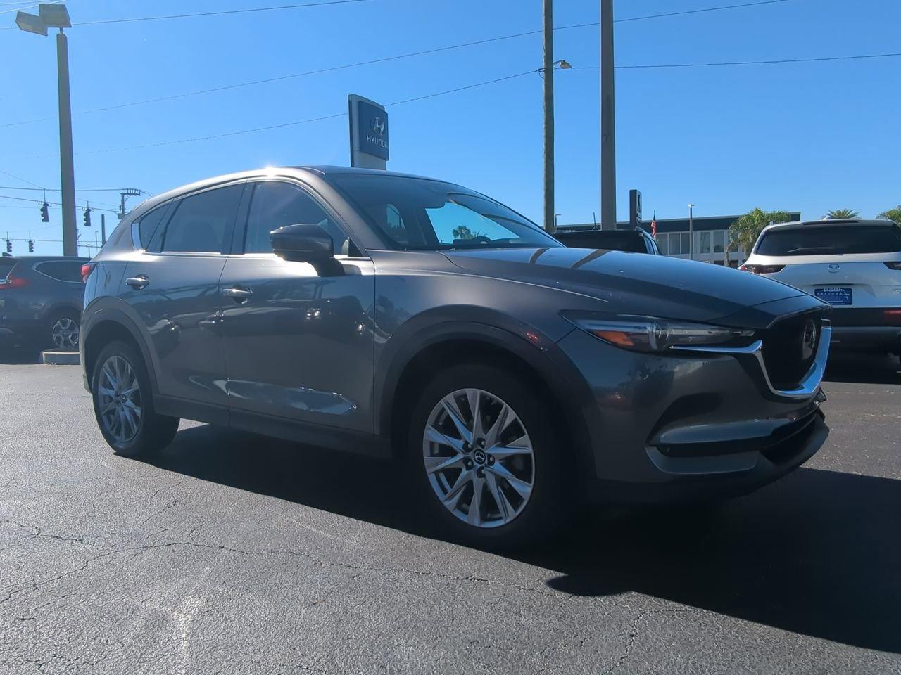 Used 2019 Mazda CX-5 Grand Touring with VIN JM3KFADM5K1525201 for sale in Daytona Beach, FL