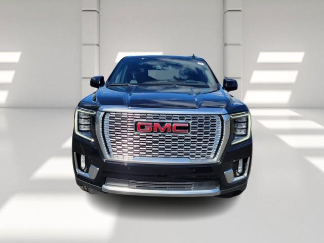 Used 2022 GMC Yukon Denali with VIN 1GKS2DKL7NR239702 for sale in Collins, MS