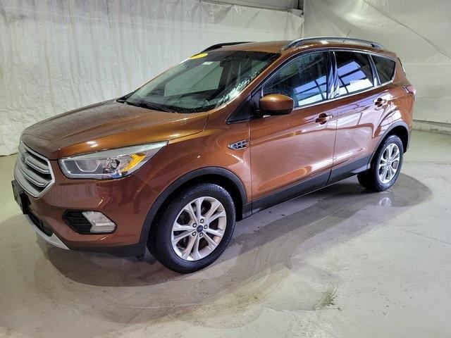 Used 2017 Ford Escape SE with VIN 1FMCU0GD2HUB24071 for sale in Pinconning, MI