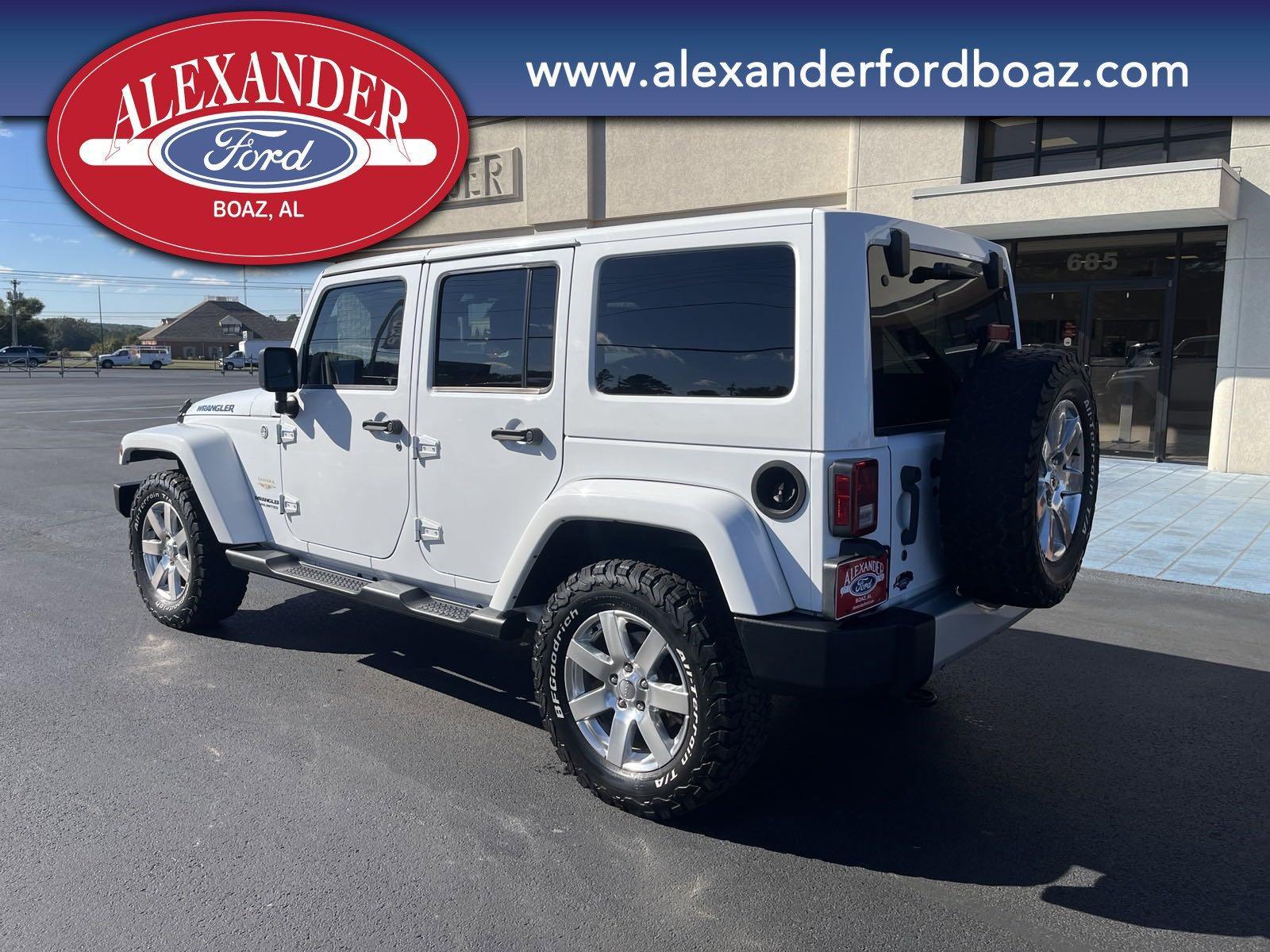 Used 2013 Jeep Wrangler Unlimited Sahara with VIN 1C4HJWEG7DL667578 for sale in Boaz, AL