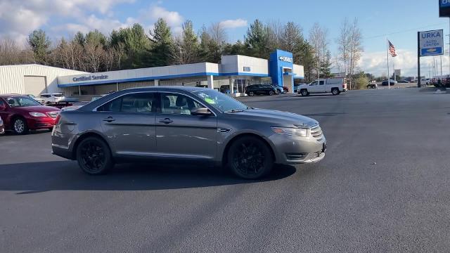 Used 2013 Ford Taurus SEL with VIN 1FAHP2H82DG132670 for sale in Ludington, MI