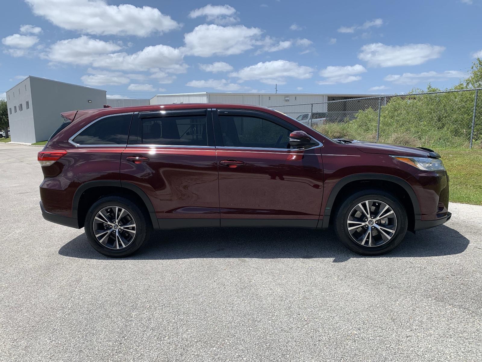 Used 2019 Toyota Highlander LE Plus with VIN 5TDZZRFH4KS343991 for sale in Winter Haven, FL