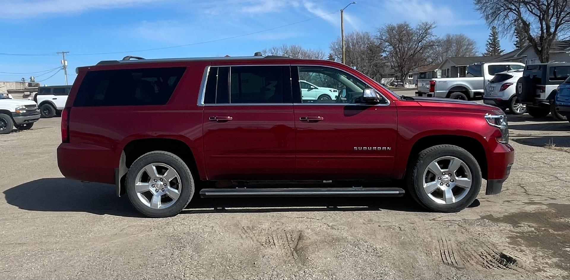 Used 2019 Chevrolet Suburban Premier with VIN 1GNSKJKC0KR297907 for sale in Milbank, SD